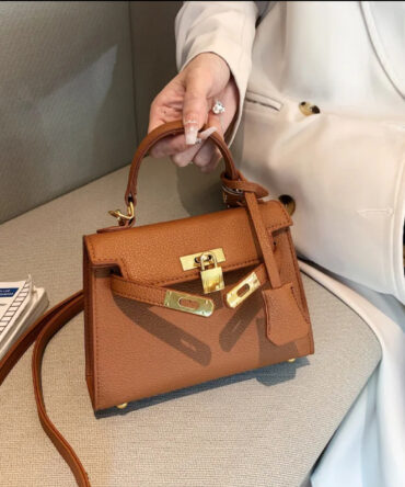 Kelly Tas Bruin