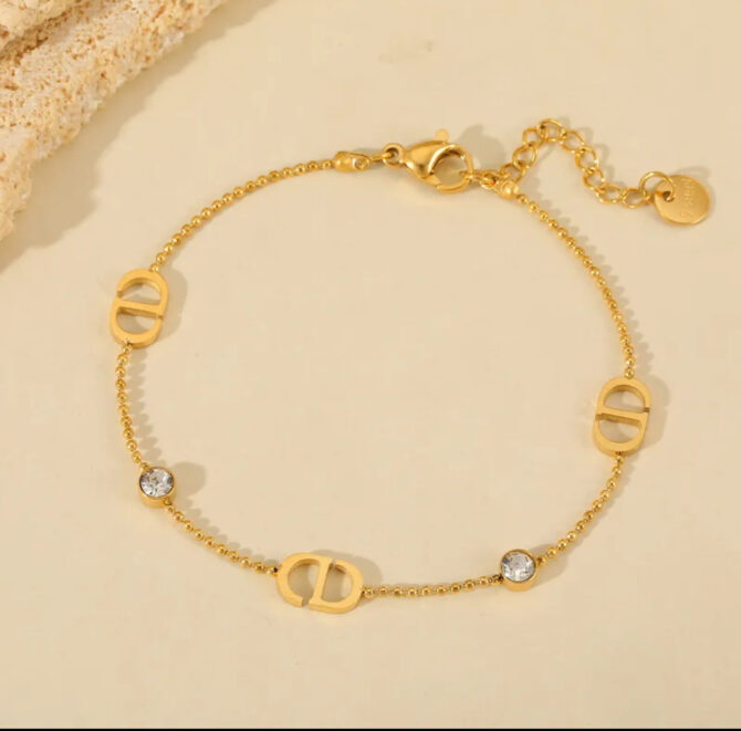 CD Goudkleurige Schakelarmband