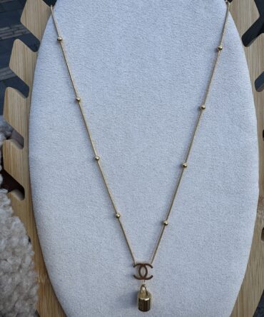 Goudkleurige Ketting met CC Logo & Slot Hanger